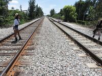 Lesbians fucking each other on train tracks | Pornsnaps