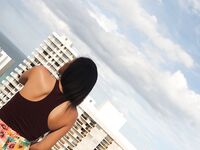 Julie Kay’s Rooftop Photoshoot with Scorpio: Elegance in a Mini Dress | Porn Snaps