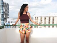 Julie Kay’s Rooftop Photoshoot with Scorpio: Elegance in a Mini Dress | Porn Snaps