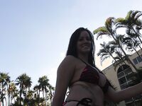 Sexy Brunette Poolside Flicking her Bean | PornSnaps